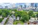 A view of a well-maintained neighborhood with beautiful homes, lush greenery and a vibrant cityscape in the background at 701 Pryor Sw St # 5, Atlanta, GA 30315