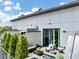 A stylish patio with comfortable seating, greenery, and an outdoor grill, perfect for relaxing and entertaining at 701 Pryor Sw St # 5, Atlanta, GA 30315