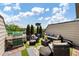 Relaxing rooftop deck features an outdoor kitchen, comfortable seating, and lush greenery perfect for entertaining or unwinding at 701 Pryor Sw St # 5, Atlanta, GA 30315