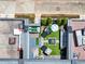 A well-appointed rooftop deck features stylish furniture and lush landscaping for a private retreat at 701 Pryor Sw St # 5, Atlanta, GA 30315