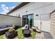 Private rooftop patio features sliding glass door access, modern lounge seating, decor, and custom flooring at 701 Pryor Sw St # 5, Atlanta, GA 30315