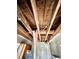 Exposed ceiling with wooden beams, in need of repairs and restoration at 1386 Bluefield Sw Dr, Atlanta, GA 30310