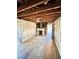 Open living space with fireplace, natural light, and potential for restoration and personalization at 1386 Bluefield Sw Dr, Atlanta, GA 30310