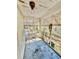 Enclosed porch with rustic screening and views of the outdoor landscape at 1386 Bluefield Sw Dr, Atlanta, GA 30310