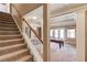Basement features stairs leading to a recreation area with a pool table at 1608 Mulberry Lake Dr, Dacula, GA 30019