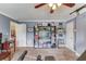 This bonus room offers ample space, neutral walls, a ceiling fan, and lots of room for storage and personalization at 1608 Mulberry Lake Dr, Dacula, GA 30019