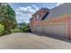 Spacious two-car garage with ample parking on a long private driveway, near the lake at 1608 Mulberry Lake Dr, Dacula, GA 30019