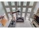 This living room has soaring ceilings, ample natural light, and a beautiful stone fireplace at 1608 Mulberry Lake Dr, Dacula, GA 30019