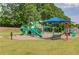 Community playground with colorful play structures and shaded seating for enjoyment at 1608 Mulberry Lake Dr, Dacula, GA 30019