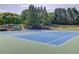 A beautifully maintained tennis court is ready for a game in this active and engaging community at 1608 Mulberry Lake Dr, Dacula, GA 30019