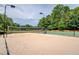 A sand volleyball court and basketball court ready for friendly competition in the community at 1608 Mulberry Lake Dr, Dacula, GA 30019