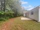 View of backyard showcasing mature trees and patio at 3146 Leyland Ct, Decatur, GA 30034