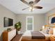 Staged bedroom featuring neutral decor, a ceiling fan, and natural lighting at 3146 Leyland Ct, Decatur, GA 30034