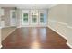 Bright dining area with hardwood floors and large windows overlooking the backyard at 3146 Leyland Ct, Decatur, GA 30034