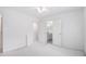 This carpeted bedroom features a walk-in closet and ensuite bathroom at 315 Hembree Grove Trce, Roswell, GA 30076