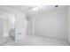 Carpeted bedroom features an ensuite bathroom and closet at 315 Hembree Grove Trce, Roswell, GA 30076