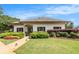 Charming community clubhouse with well-maintained landscaping and American flags at 315 Hembree Grove Trce, Roswell, GA 30076