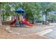 Community playground featuring slides, climbing structures, and a safe, mulched play area at 315 Hembree Grove Trce, Roswell, GA 30076