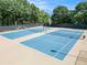 Two well-maintained tennis courts with lights, perfect for a friendly match day or night at 315 Hembree Grove Trce, Roswell, GA 30076