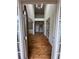 Grand foyer with hardwood floors, soaring ceilings, and an elegant chandelier at 6725 Grove Meadows Ln, Cumming, GA 30028