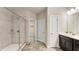 Bathroom featuring a tiled shower and modern vanity at 1914 Forte Ln, Alpharetta, GA 30009