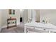 Well-lit office space, featuring white desk and modern decor, with storage at 1914 Forte Ln, Alpharetta, GA 30009