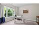 Bright office with a large window and natural light, a desk, and neutral decor at 1914 Forte Ln, Alpharetta, GA 30009