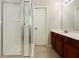Bathroom featuring a standard shower and a vanity at 2173 Pebble Beach Dr, Lawrenceville, GA 30043
