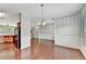 Dining room showcasing hardwood floors and an open layout at 2173 Pebble Beach Dr, Lawrenceville, GA 30043