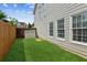 Cozy backyard featuring a well-maintained lawn and privacy fence perfect for outdoor enjoyment at 2713 Stillwater Lake Ln, Marietta, GA 30066