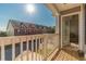 Balcony view showcasing nearby building, accessible via a doorway bringing the outside in at 7162 Fringe Flower Dr, Austell, GA 30168