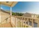 Balcony showcasing nearby building, accessible via a doorway bringing the outside in at 7162 Fringe Flower Dr, Austell, GA 30168