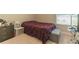 Bedroom with a comfortable bed, dresser, and window views at 7162 Fringe Flower Dr, Austell, GA 30168