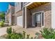 Exterior of the townhouse with front porch and brick base at 7162 Fringe Flower Dr, Austell, GA 30168