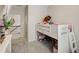 Bedroom with bunk bed, toys, and neutral carpet at 9007 Jim Purcell Dr, Covington, GA 30014