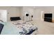 Large main bedroom with neutral carpet, accent seating and lots of open space at 9007 Jim Purcell Dr, Covington, GA 30014