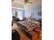 Comfortable bedroom features blue walls, a ceiling fan, and a plaid comforter on the bed at 215 Boca Ciega Ct, Alpharetta, GA 30022