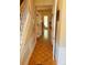 Welcoming foyer with hardwood floors, white trim, and an open doorway revealing the light-filled interior at 215 Boca Ciega Ct, Alpharetta, GA 30022