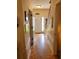 Entryway with hardwood floors, white trim, and views of the front door and staircase to the left at 215 Boca Ciega Ct, Alpharetta, GA 30022