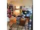 Cozy living room featuring unique decor, a book case, and lots of personal touches at 215 Boca Ciega Ct, Alpharetta, GA 30022