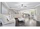 Open floor plan with living room, dining area, and kitchen at 2939 Woodward Down Trl, Buford, GA 30519