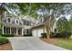 Charming two-story home with a well-manicured front yard and a two-car garage at 4404 Old Georgetown Trl, Atlanta, GA 30338