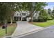 Traditional two-story home with a well-manicured lawn at 4404 Old Georgetown Trl, Atlanta, GA 30338