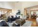 Open-concept living room with staircase access to the second floor and views to dining room at 4404 Old Georgetown Trl, Atlanta, GA 30338