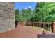 Spacious deck overlooking an expansive backyard with mature trees at 4885 Maristone Landing Way, Cumming, GA 30040