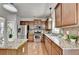 Bright kitchen with stainless steel appliances and granite countertops at 4885 Maristone Landing Way, Cumming, GA 30040