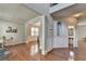 Open living space with hardwood floors, molding detail, and natural light at 4885 Maristone Landing Way, Cumming, GA 30040