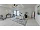 Spacious main bedroom with tray ceiling, neutral colors, ceiling fan, and plush carpet at 4885 Maristone Landing Way, Cumming, GA 30040