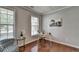 Bright office space featuring hardwood floors, two large windows, and neutral paint at 4885 Maristone Landing Way, Cumming, GA 30040