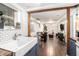 Open-concept basement with kitchen, dining area, and living room creating a versatile space at 677 Holmes Nw St, Atlanta, GA 30318